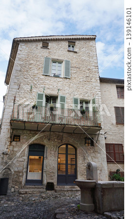 Traditional old stone houses on a street in the medieval town of Saint Paul de Vence, French Riviera, South of France Traditional old stone houses on a street in the medieval town of Saint Paul de Vence, French Riviera, South of France 139146101
