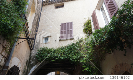 Traditional old stone houses on a street in the medieval town of Saint Paul de Vence, French Riviera, South of France Traditional old stone houses on a street in the medieval town of Saint Paul de Vence, French Riviera, South of France 139146102