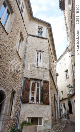 Traditional old stone houses on a street in the medieval town of Saint Paul de Vence, French Riviera, South of France Traditional old stone houses on a street in the medieval town of Saint Paul de Vence, French Riviera, South of France 139146103