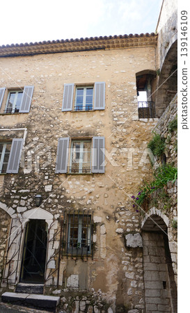Traditional old stone houses on a street in the medieval town of Saint Paul de Vence, French Riviera, South of France Traditional old stone houses on a street in the medieval town of Saint Paul de Vence, French Riviera, South of France 139146109