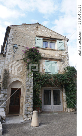 Traditional old stone houses on a street in the medieval town of Saint Paul de Vence, French Riviera, South of France Traditional old stone houses on a street in the medieval town of Saint Paul de Vence, French Riviera, South of France 139146113