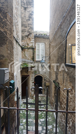 Traditional old stone houses on a street in the medieval town of Saint Paul de Vence, French Riviera, South of France Traditional old stone houses on a street in the medieval town of Saint Paul de Vence, French Riviera, South of France 139146127