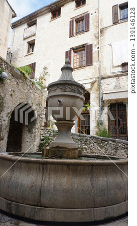 Traditional old stone houses on a street in the medieval town of Saint Paul de Vence, French Riviera, South of France Traditional old stone houses on a street in the medieval town of Saint Paul de Vence, French Riviera, South of France 139146128