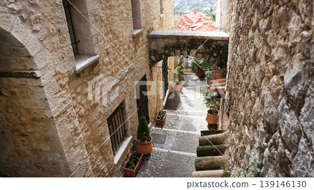 Traditional old stone houses on a street in the medieval town of Saint Paul de Vence, French Riviera, South of France Traditional old stone houses on a street in the medieval town of Saint Paul de Vence, French Riviera, South of France 139146130