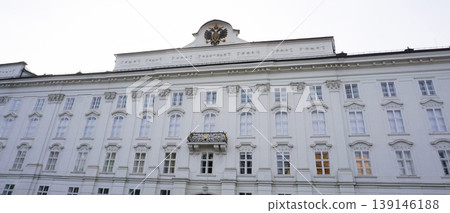 Historic facades at old street of Innsbruck view, alpine city in Tirol, region of Austria Historic facades at old street of Innsbruck view, alpine city in Tirol, region of Austria 139146188