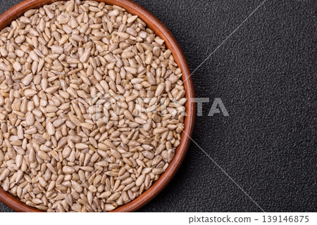 Shelled sunflower seed kernels, salted, roasted, or raw, are a healthy ingredient. Sunflower seeds 139146875