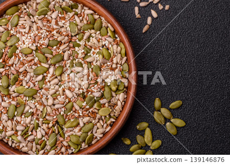 Shelled sunflower, sesame, pumpkin, and flaxseed kernels as ingredients for healthy food 139146876