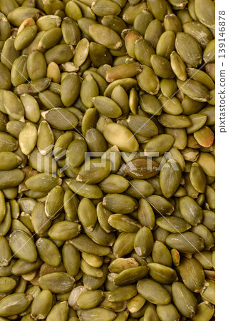 Shelled pumpkin seed kernels, salted, roasted, or raw, are a healthy ingredient. Pumpkin seeds Shelled pumpkin seed kernels, salted, roasted, or raw, are a healthy ingredient. Pumpkin seeds 139146878