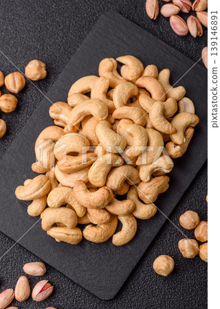 Roasted or raw cashew make a savory snack for a healthy, filling meal. Cashew nuts Roasted or raw cashew make a savory snack for a healthy, filling meal. Cashew nuts 139146891