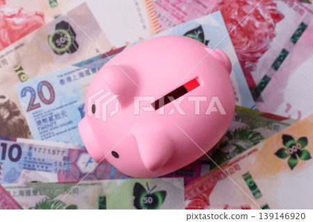 A piggy bank as a concept for storing, accumulating, and saving financial resources. A piggy bank A piggy bank as a concept for storing, accumulating, and saving financial resources. A piggy bank 139146920