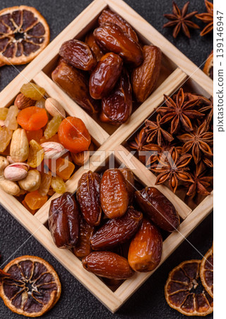 Dried dates on a ceramic plate for Ramadan or Iftar. Dates fruit as a background 139146947