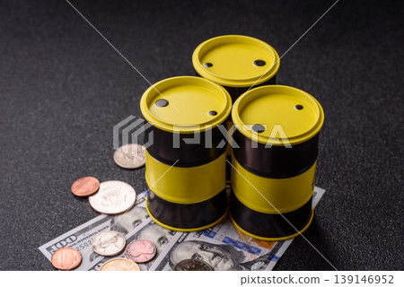 A barrel of oil against a backdrop of dollars as a concept for the oil crisis. A barrel of oil A barrel of oil against a backdrop of dollars as a concept for the oil crisis. A barrel of oil 139146952