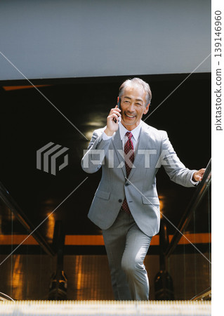 Senior male to talk on smartphone Senior male to talk on smartphone 139146960