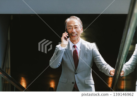 Senior male to talk on smartphone 139146962