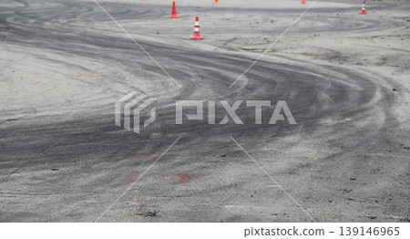 Traces of tires after car drifting on the asphalt  139146965