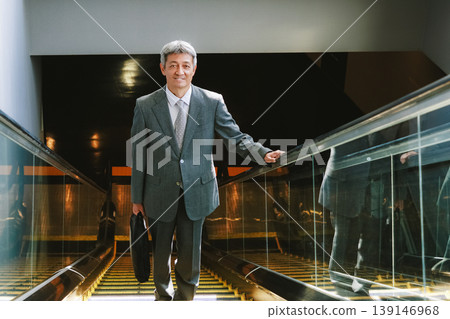 Senior male to talk on smartphone 139146968