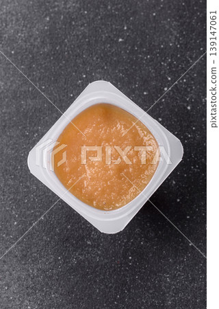 Apple sweet sauce, baby food, canned ingredient for desserts. Apple sauce Apple sweet sauce, baby food, canned ingredient for desserts. Apple sauce 139147061