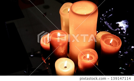 Flames of variety candles in romFlames of variety candles in romantic mood in darknessantic mood in darkness Flames of variety candles in romFlames of variety candles in romantic mood in darknessantic mood in darkness 139147114