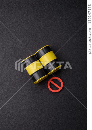 Metal barrels containing oil, gas, or chemicals, with a prohibition sign. Oil barrels Metal barrels containing oil, gas, or chemicals, with a prohibition sign. Oil barrels 139147138