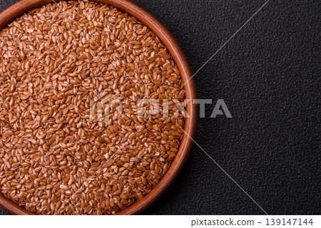 Flaxseed as an ingredient for oil, organic flour, and healthy foods. Flax seeds Flaxseed as an ingredient for oil, organic flour, and healthy foods. Flax seeds 139147144