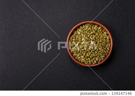 Shelled pumpkin seed kernels, salted, roasted, or raw, are a healthy ingredient. Pumpkin seeds Shelled pumpkin seed kernels, salted, roasted, or raw, are a healthy ingredient. Pumpkin seeds 139147146