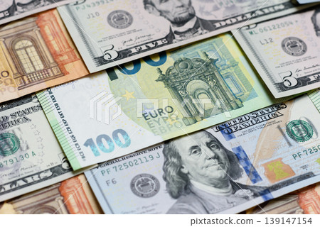 Euro and dollar banknotes, exchange, sales, economic tariffs and taxes. Euros and dollars 139147154