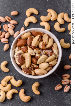 Brazil nuts, raw and shelled, are a source of selenium and a healthy food ingredient. Brazil nuts 139147179