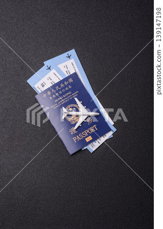 A Hong Kong passport, a document for travel, leisure, and work. A Hong Kong passport A Hong Kong passport, a document for travel, leisure, and work. A Hong Kong passport 139147198