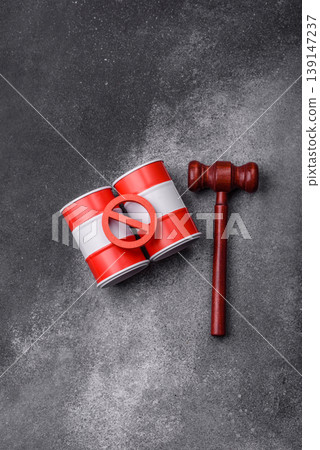 Metal barrels containing oil, gas, or chemicals, with a prohibition sign. Oil barrels Metal barrels containing oil, gas, or chemicals, with a prohibition sign. Oil barrels 139147237