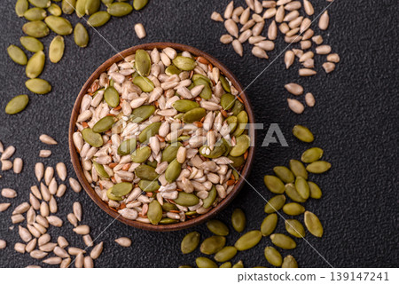 Shelled sunflower, sesame, pumpkin, and flaxseed kernels as ingredients for healthy food 139147241