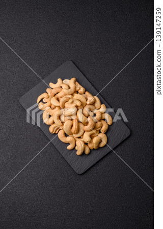 Roasted or raw cashew make a savory snack for a healthy, filling meal. Cashew nuts Roasted or raw cashew make a savory snack for a healthy, filling meal. Cashew nuts 139147259