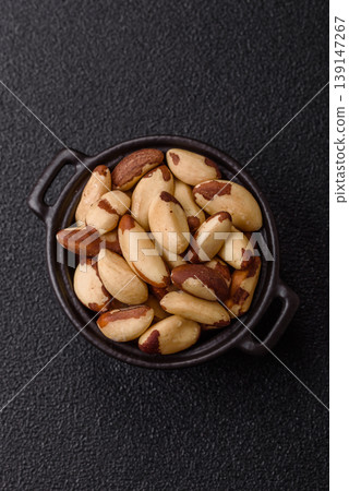Brazil nuts, raw and shelled, are a source of selenium and a healthy food ingredient. Brazil nuts 139147267