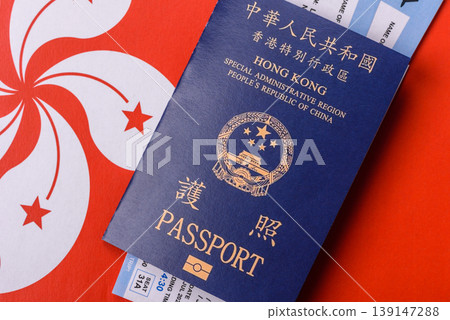 A Hong Kong passport, a document for travel, leisure, and work. A Hong Kong passport A Hong Kong passport, a document for travel, leisure, and work. A Hong Kong passport 139147288