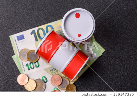 A barrel of oil against a backdrop of euro as a concept for the oil crisis. A barrel of oil 139147350