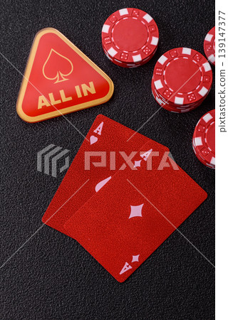 Playing cards and chips on a table, a gambling game of blackjack or baccarat. Cards and chips 139147377