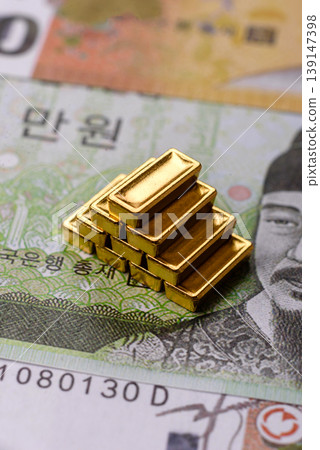 Gold bars or ingots as a tool for balance, financial investment, and savings. Gold bars Gold bars or ingots as a tool for balance, financial investment, and savings. Gold bars 139147398