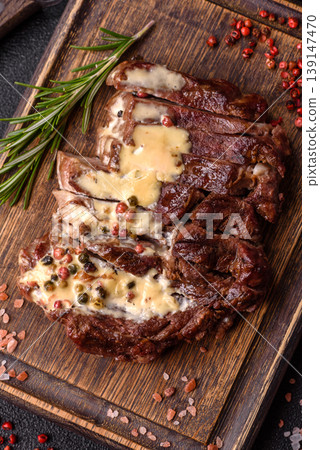 Steak, beef or pork meat grilled or barbecued with salt and spices. Beef steak 139147470