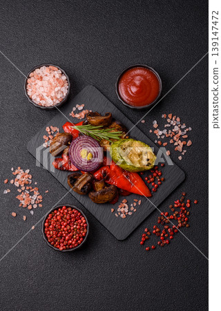 Grilled vegetables: bell peppers, zucchini, eggplant, onions, and corn. Grilled vegetables Grilled vegetables: bell peppers, zucchini, eggplant, onions, and corn. Grilled vegetables 139147472