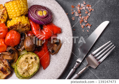 Grilled vegetables: bell peppers, zucchini, eggplant, onions, and corn. Grilled vegetables Grilled vegetables: bell peppers, zucchini, eggplant, onions, and corn. Grilled vegetables 139147473