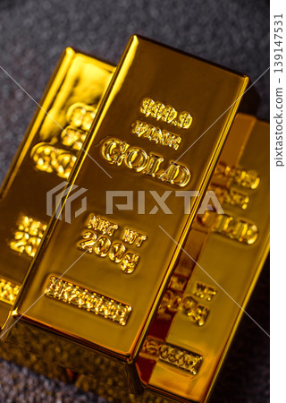 Gold bars or ingots as a metal for bank storage, investments, and financial transactions. Gold bars Gold bars or ingots as a metal for bank storage, investments, and financial transactions. Gold bars 139147531