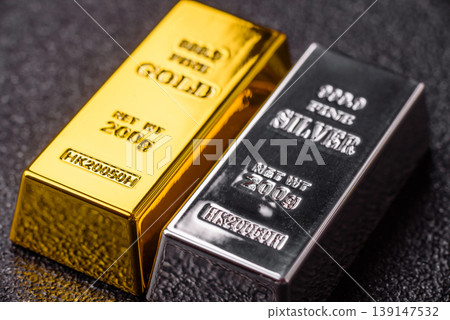 Gold and silver bullion or ingots as metals for bank storage, investments. Gold and silver bars Gold and silver bullion or ingots as metals for bank storage, investments. Gold and silver bars 139147532