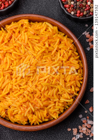 Kabsa or haneeth, an Arabic dish with rice and chicken, salt, and spices. Kabsa or haneeth Kabsa or haneeth, an Arabic dish with rice and chicken, salt, and spices. Kabsa or haneeth 139147592