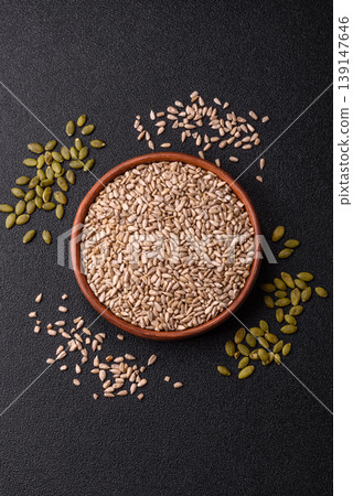 Shelled sunflower seed kernels, salted, roasted, or raw, are a healthy ingredient. Sunflower seeds 139147646