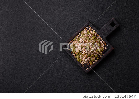 Shelled sunflower, sesame, pumpkin, and flaxseed kernels as ingredients for healthy food Shelled sunflower, sesame, pumpkin, and flaxseed kernels as ingredients for healthy food 139147647