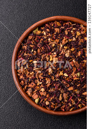 Dry herbal or fruit tea with flower petals and aromatic additives. Dry fruit herbal tea Dry herbal or fruit tea with flower petals and aromatic additives. Dry fruit herbal tea 139147727