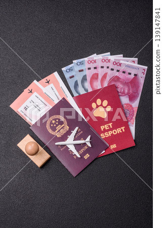 China, Chinese passport with money and flight tickets. Chinese passport 139147841