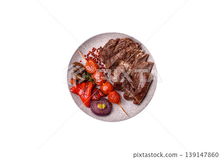 Steak, beef or pork meat grilled or barbecued with salt and spices. Beef steak Steak, beef or pork meat grilled or barbecued with salt and spices. Beef steak 139147860