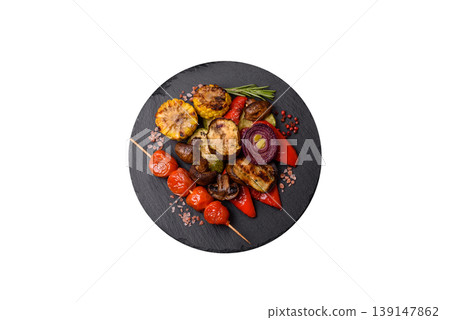 Grilled vegetables: bell peppers, zucchini, eggplant, onions, and corn. Grilled vegetables Grilled vegetables: bell peppers, zucchini, eggplant, onions, and corn. Grilled vegetables 139147862