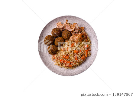 Kabsa or mandi, an Arabic dish with rice and chicken, salt, and spices. Kabsa or mandi 139147867
