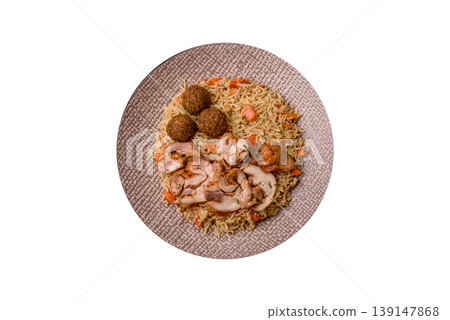 Kabsa or mandi, an Arabic dish with rice and chicken, salt, and spices. Kabsa or mandi Kabsa or mandi, an Arabic dish with rice and chicken, salt, and spices. Kabsa or mandi 139147868